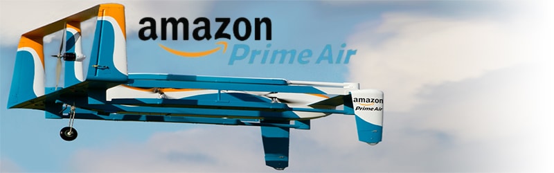 Aerial drone showcasing Amazon Prime Air technology gliding against a cloudy sky.