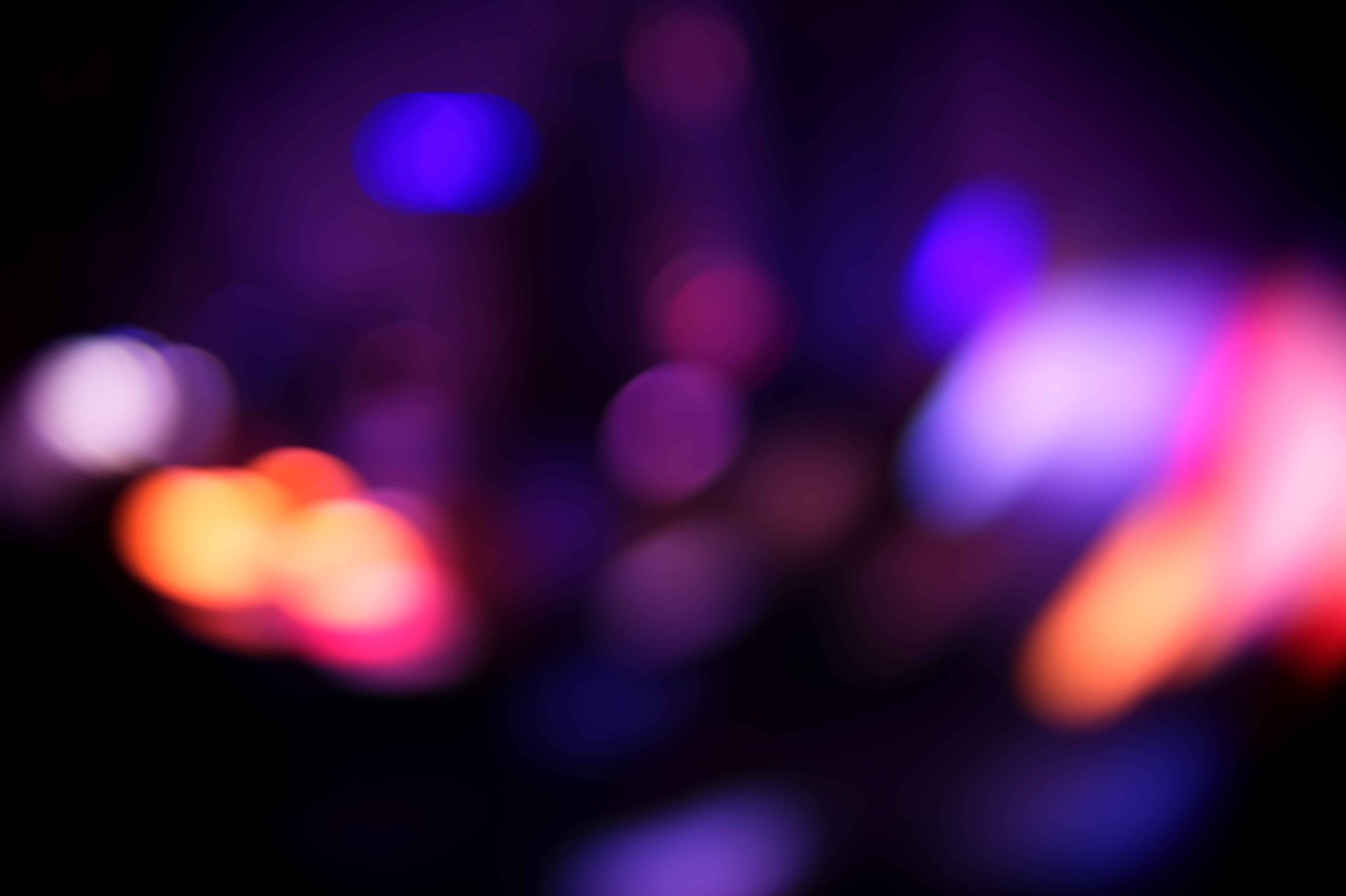 Vibrant colorful lighting effects for an event, showcasing stage and ambient illumination for a dynamic atmosphere.
