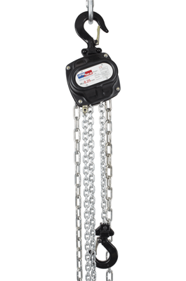 Stage rigging chain hoist used for lifting heavy equipment in event production setups.